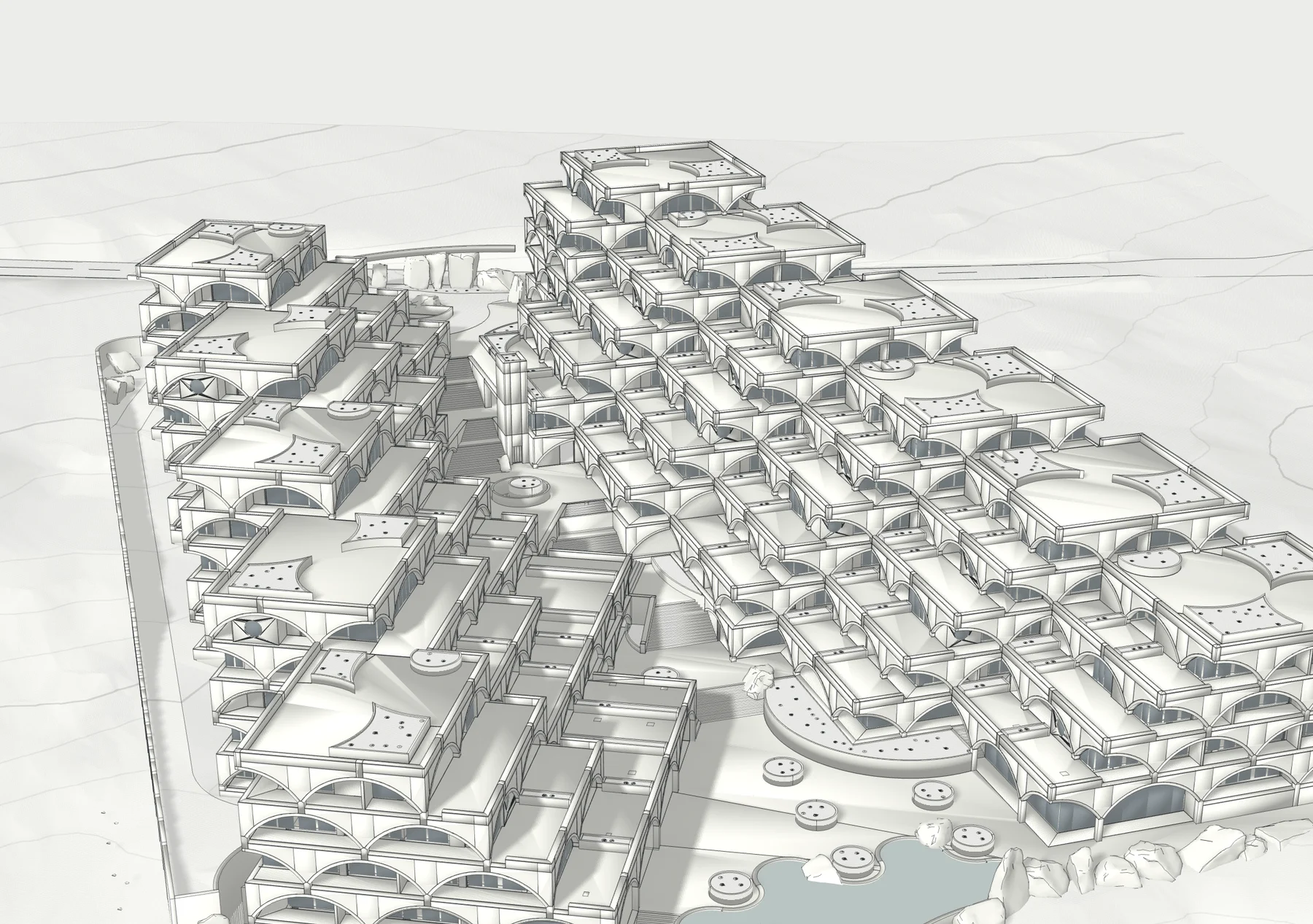 The same plan raised: Veranda Residences, their terraces and arches as a white maquette, seen from the sea