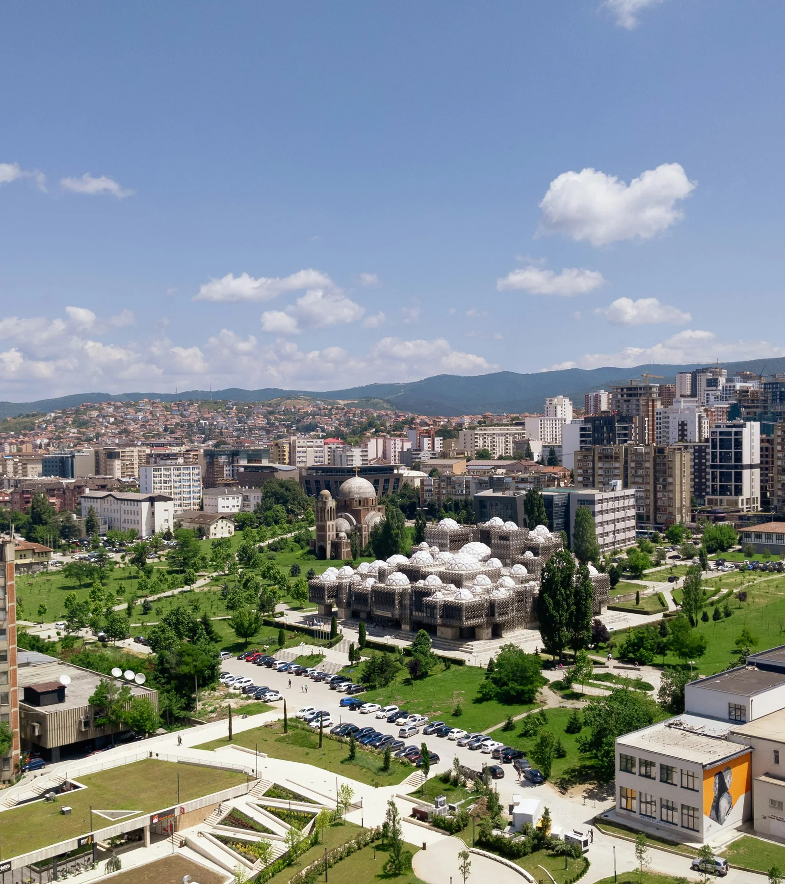The centre of Prishtina with the Mother Teresa Cathedral and the National Library